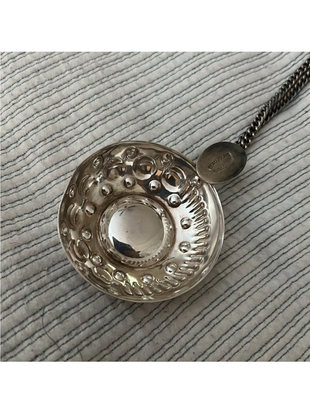 Vintage sommelier tastevin